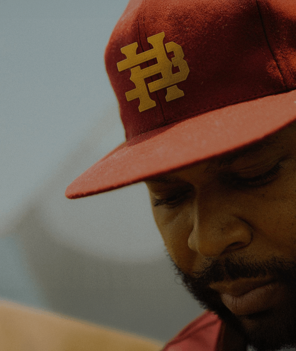 Bay Hills Church hat designed by BLVR, shown on member to showcase belief-driven church branding in action